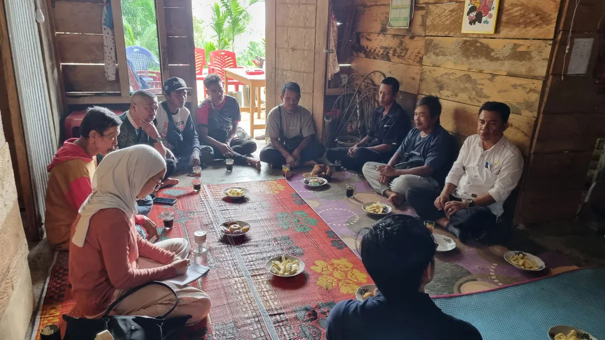 Community members in a group discussion
